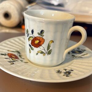 This is a Richard Ginori demitasse cup and saucer set in the "L-7" pattern.